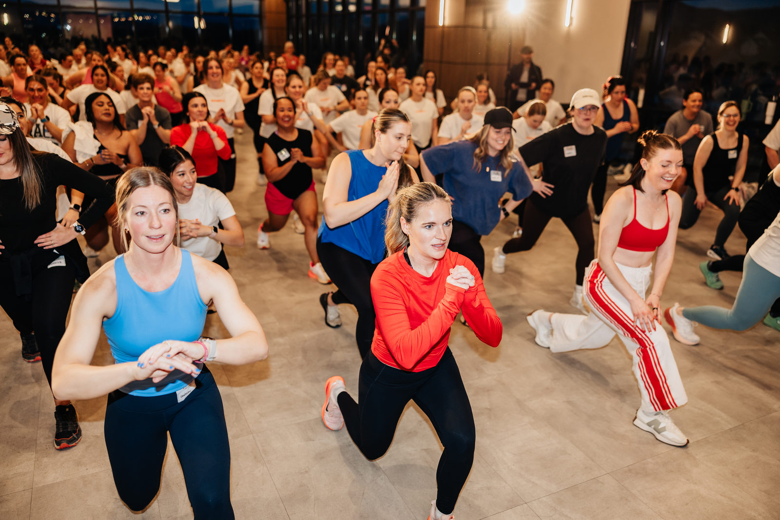 A room full of challenge members mid-workout.